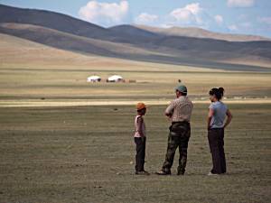 tour guide and leader negotiating with local shepherd boy