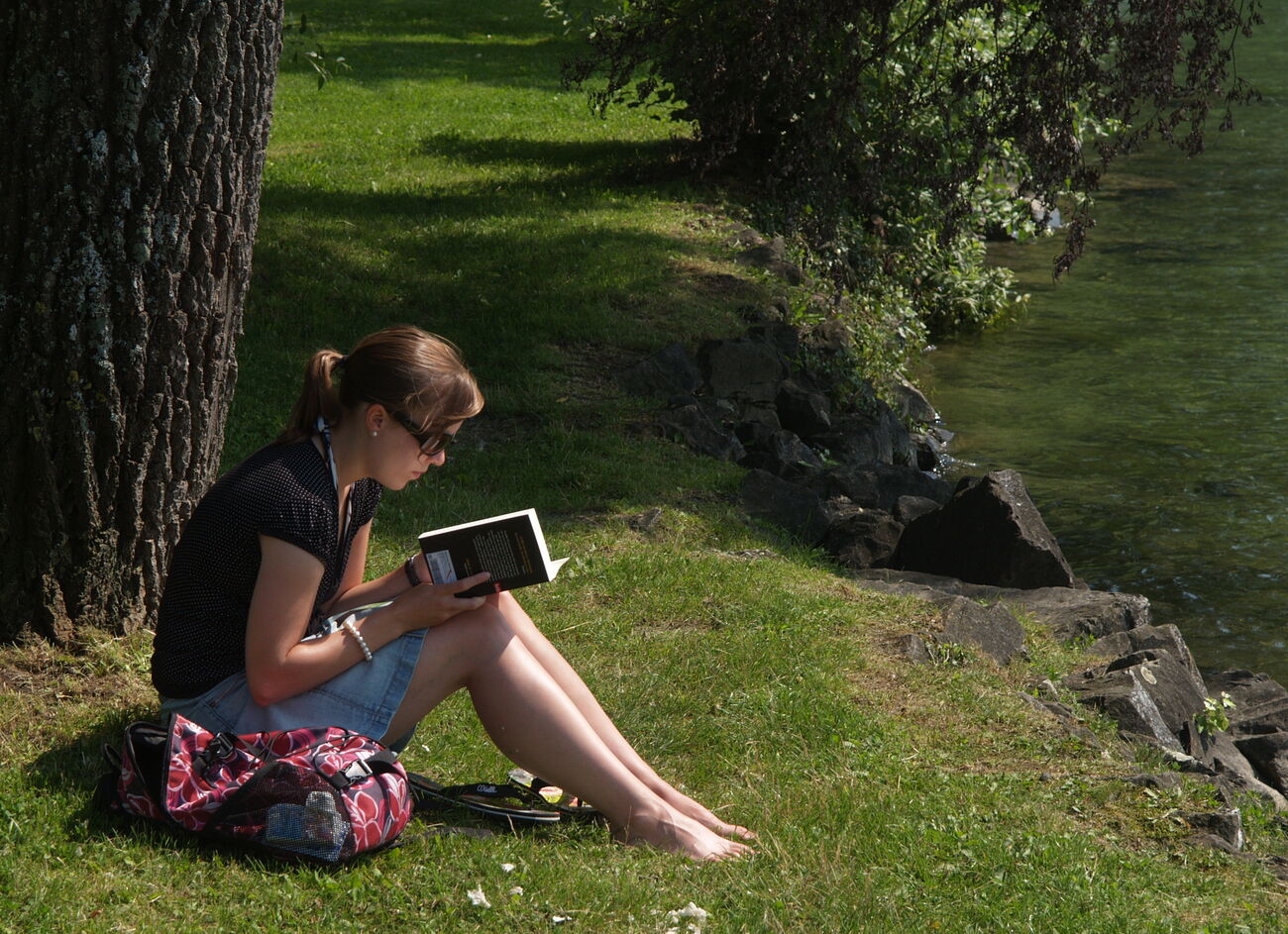 [Image: a8107653-reading-by-the-lake.jpg]