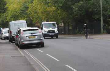 the cycle lane runs straight into the parked cars